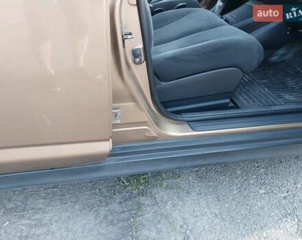 Желтый Ниссан Тиида, объемом двигателя 1.6 л и пробегом 325 тыс. км за 5350 $, фото 7 на Automoto.ua