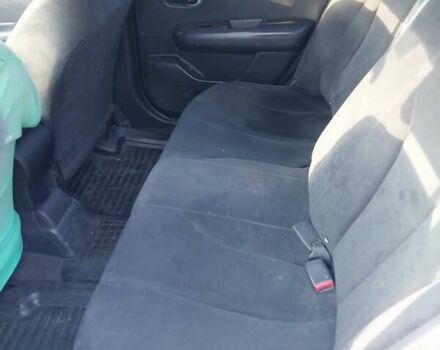 Желтый Ниссан Тиида, объемом двигателя 1.6 л и пробегом 325 тыс. км за 5350 $, фото 13 на Automoto.ua