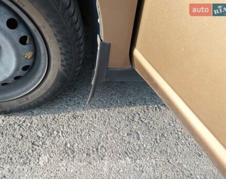 Желтый Ниссан Тиида, объемом двигателя 1.6 л и пробегом 325 тыс. км за 5350 $, фото 14 на Automoto.ua