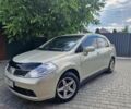 Жовтий Ніссан Тііда, об'ємом двигуна 1.6 л та пробігом 255 тис. км за 4999 $, фото 1 на Automoto.ua