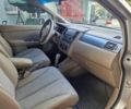 Жовтий Ніссан Тііда, об'ємом двигуна 1.6 л та пробігом 255 тис. км за 4999 $, фото 19 на Automoto.ua