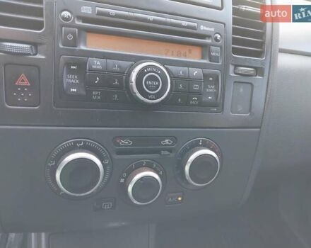 Желтый Ниссан Тиида, объемом двигателя 1.6 л и пробегом 325 тыс. км за 5350 $, фото 11 на Automoto.ua