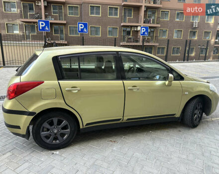 Желтый Ниссан Тиида, объемом двигателя 1.6 л и пробегом 168 тыс. км за 5300 $, фото 2 на Automoto.ua