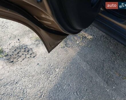 Желтый Ниссан Тиида, объемом двигателя 1.6 л и пробегом 325 тыс. км за 5350 $, фото 15 на Automoto.ua