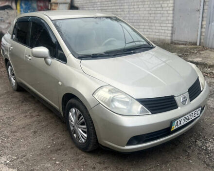 Желтый Ниссан Тиида, объемом двигателя 1.6 л и пробегом 204 тыс. км за 4300 $, фото 1 на Automoto.ua