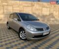 Сірий Ніссан Тііда, об'ємом двигуна 1.6 л та пробігом 145 тис. км за 6299 $, фото 1 на Automoto.ua