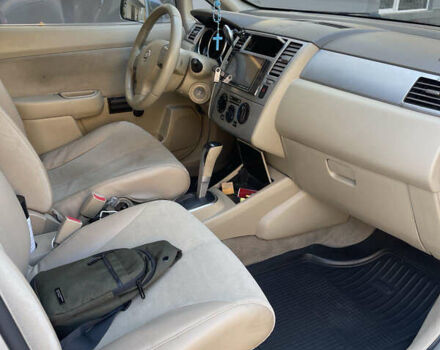 Серый Ниссан Тиида, объемом двигателя 1.6 л и пробегом 249 тыс. км за 5200 $, фото 4 на Automoto.ua