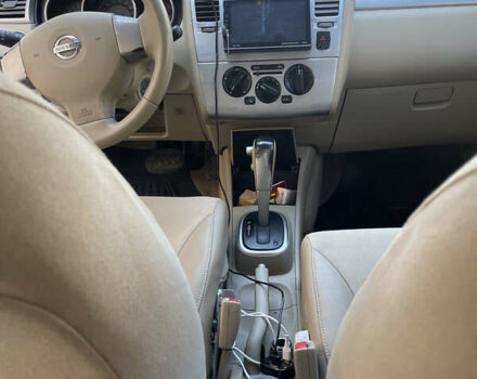 Серый Ниссан Тиида, объемом двигателя 1.6 л и пробегом 249 тыс. км за 5200 $, фото 5 на Automoto.ua