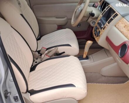 Серый Ниссан Тиида, объемом двигателя 1.6 л и пробегом 182 тыс. км за 6140 $, фото 14 на Automoto.ua