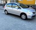 Серый Ниссан Тиида, объемом двигателя 1.6 л и пробегом 246 тыс. км за 6200 $, фото 1 на Automoto.ua