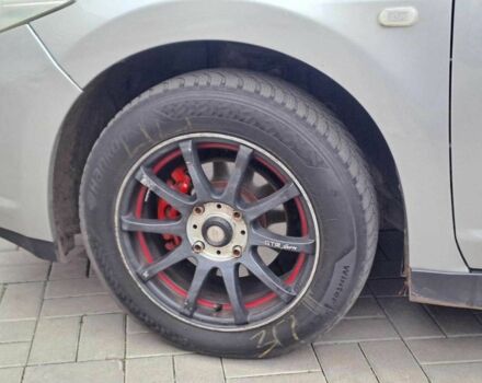 Серый Ниссан Тиида, объемом двигателя 1.6 л и пробегом 182 тыс. км за 6140 $, фото 8 на Automoto.ua