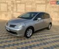 Сірий Ніссан Тііда, об'ємом двигуна 1.6 л та пробігом 145 тис. км за 6299 $, фото 4 на Automoto.ua