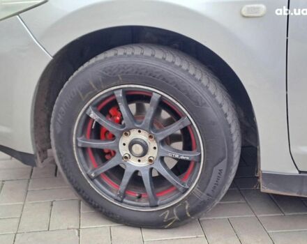 Серый Ниссан Тиида, объемом двигателя 1.6 л и пробегом 182 тыс. км за 6140 $, фото 8 на Automoto.ua