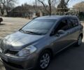 Серый Ниссан Тиида, объемом двигателя 1.6 л и пробегом 240 тыс. км за 5500 $, фото 3 на Automoto.ua