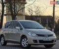 Сірий Ніссан Тііда, об'ємом двигуна 1.6 л та пробігом 148 тис. км за 6499 $, фото 1 на Automoto.ua