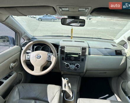 Серый Ниссан Тиида, объемом двигателя 0 л и пробегом 182 тыс. км за 4999 $, фото 2 на Automoto.ua