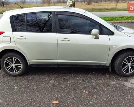 Серый Ниссан Тиида, объемом двигателя 1.6 л и пробегом 271 тыс. км за 5000 $, фото 2 на Automoto.ua