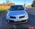 Сірий Ніссан Тііда, об'ємом двигуна 1.6 л та пробігом 255 тис. км за 6200 $, фото 1 на Automoto.ua