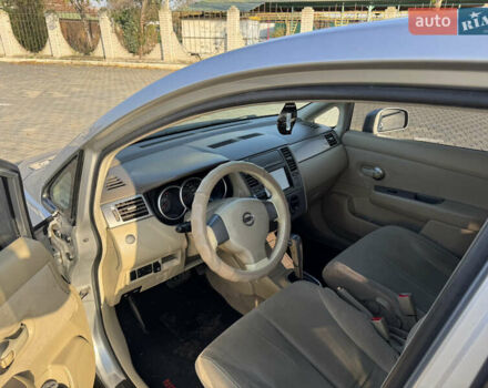 Серый Ниссан Тиида, объемом двигателя 1.6 л и пробегом 161 тыс. км за 5700 $, фото 18 на Automoto.ua