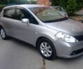 Серый Ниссан Тиида, объемом двигателя 1.6 л и пробегом 183 тыс. км за 6102 $, фото 1 на Automoto.ua