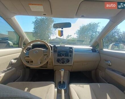 Серый Ниссан Тиида, объемом двигателя 1.6 л и пробегом 122 тыс. км за 7200 $, фото 1 на Automoto.ua