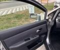 Серый Ниссан Тиида, объемом двигателя 1.6 л и пробегом 211 тыс. км за 5300 $, фото 2 на Automoto.ua