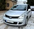 Сірий Ніссан Тііда, об'ємом двигуна 1.6 л та пробігом 155 тис. км за 6760 $, фото 1 на Automoto.ua