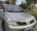 Серый Ниссан Тиида, объемом двигателя 1.6 л и пробегом 211 тыс. км за 5300 $, фото 1 на Automoto.ua