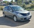 Серый Ниссан Тиида, объемом двигателя 1.8 л и пробегом 182 тыс. км за 5200 $, фото 2 на Automoto.ua