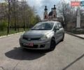 Сірий Ніссан Тііда, об'ємом двигуна 1.6 л та пробігом 214 тис. км за 5690 $, фото 1 на Automoto.ua