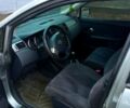 Сірий Ніссан Тііда, об'ємом двигуна 1.6 л та пробігом 213 тис. км за 6250 $, фото 1 на Automoto.ua