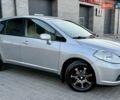 Серый Ниссан Тиида, объемом двигателя 1.6 л и пробегом 127 тыс. км за 7300 $, фото 1 на Automoto.ua