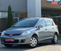 Серый Ниссан Тиида, объемом двигателя 1.6 л и пробегом 145 тыс. км за 6990 $, фото 1 на Automoto.ua