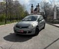 Серый Ниссан Тиида, объемом двигателя 1.6 л и пробегом 214 тыс. км за 5690 $, фото 1 на Automoto.ua