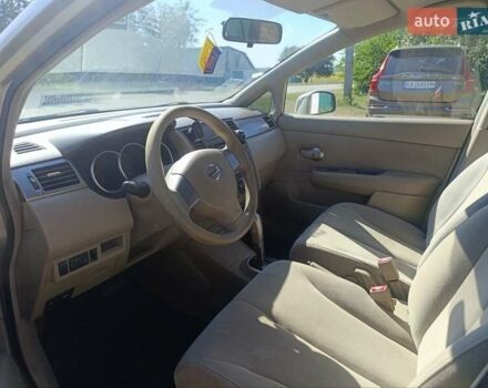 Серый Ниссан Тиида, объемом двигателя 1.6 л и пробегом 122 тыс. км за 7200 $, фото 2 на Automoto.ua