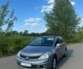 Серый Ниссан Тиида, объемом двигателя 1.6 л и пробегом 325 тыс. км за 5500 $, фото 1 на Automoto.ua