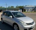 Серый Ниссан Тиида, объемом двигателя 1.6 л и пробегом 167 тыс. км за 5600 $, фото 1 на Automoto.ua
