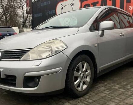 Серый Ниссан Тиида, объемом двигателя 1.8 л и пробегом 216 тыс. км за 4700 $, фото 1 на Automoto.ua