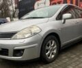 Серый Ниссан Тиида, объемом двигателя 1.8 л и пробегом 216 тыс. км за 4700 $, фото 1 на Automoto.ua