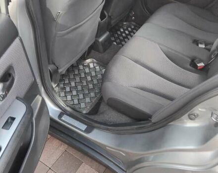 Серый Ниссан Тиида, объемом двигателя 1.6 л и пробегом 210 тыс. км за 6000 $, фото 2 на Automoto.ua