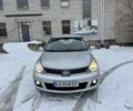Сірий Ніссан Тііда, об'ємом двигуна 1.6 л та пробігом 200 тис. км за 4400 $, фото 1 на Automoto.ua
