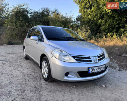 Серый Ниссан Тиида, объемом двигателя 1.5 л и пробегом 106 тыс. км за 8299 $, фото 1 на Automoto.ua