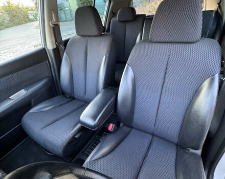 Серый Ниссан Тиида, объемом двигателя 1.5 л и пробегом 106 тыс. км за 8299 $, фото 3 на Automoto.ua