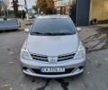 Серый Ниссан Тиида, объемом двигателя 1.5 л и пробегом 97 тыс. км за 7799 $, фото 3 на Automoto.ua