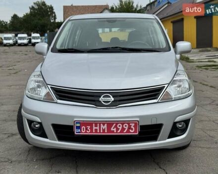 Серый Ниссан Тиида, объемом двигателя 1.6 л и пробегом 146 тыс. км за 6700 $, фото 1 на Automoto.ua
