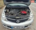 Серый Ниссан Тиида, объемом двигателя 1.6 л и пробегом 186 тыс. км за 5800 $, фото 1 на Automoto.ua