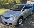 Сірий Ніссан Тііда, об'ємом двигуна 1.6 л та пробігом 144 тис. км за 4800 $, фото 1 на Automoto.ua