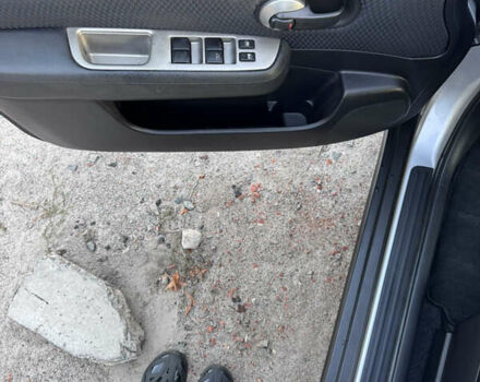 Серый Ниссан Тиида, объемом двигателя 1.5 л и пробегом 106 тыс. км за 8299 $, фото 10 на Automoto.ua