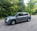 Серый Ниссан Тиида, объемом двигателя 1.6 л и пробегом 128 тыс. км за 5800 $, фото 2 на Automoto.ua