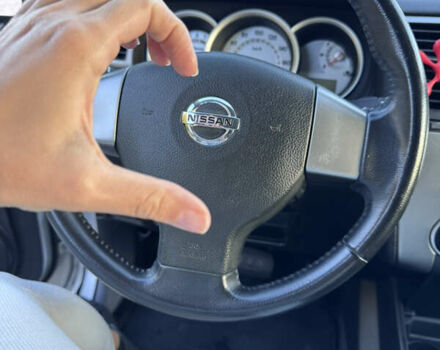 Серый Ниссан Тиида, объемом двигателя 1.5 л и пробегом 106 тыс. км за 8299 $, фото 4 на Automoto.ua